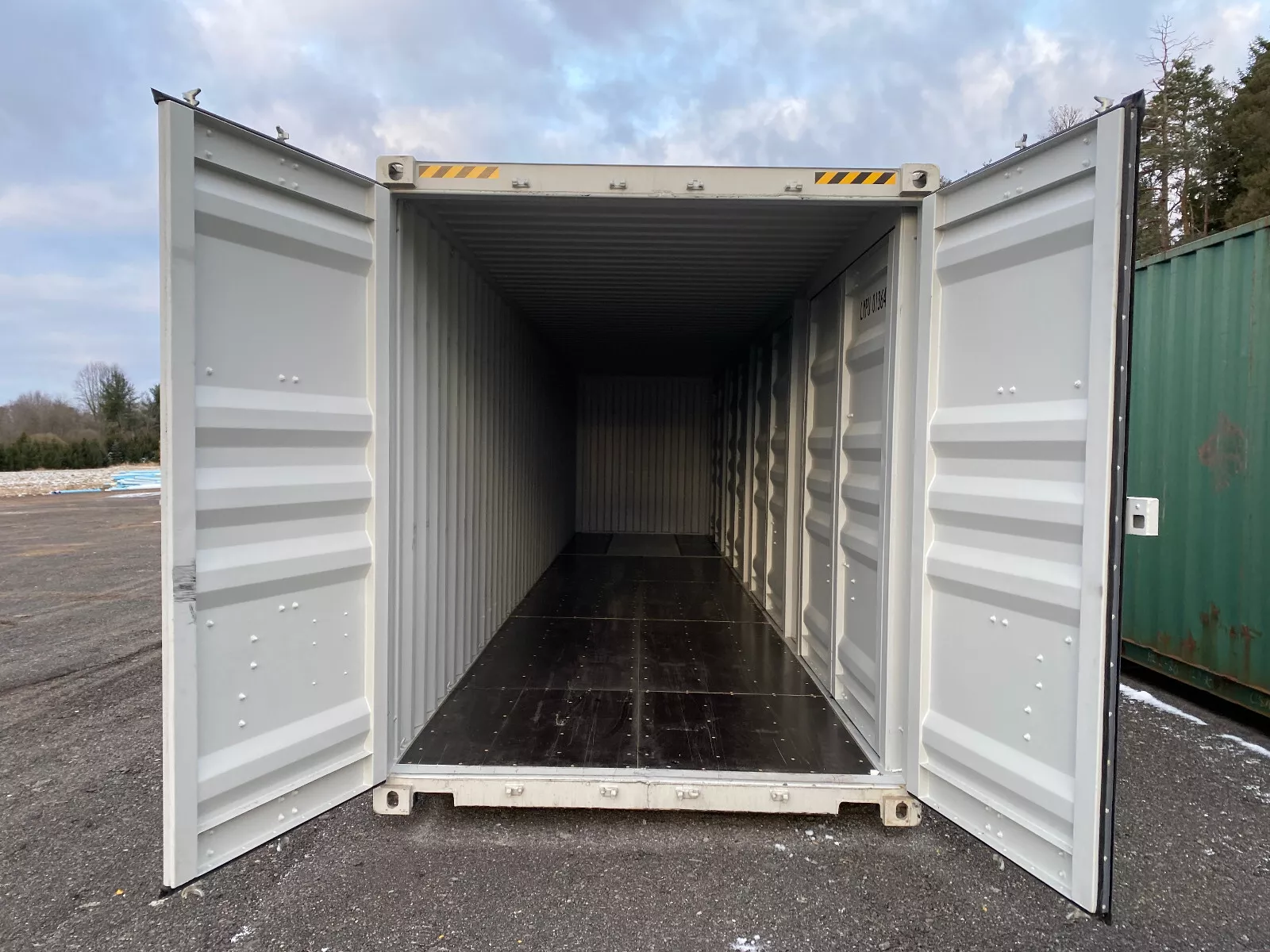 NEW-40-One-Trip-Shipping-Container-WITH-SIDE-DOORS.webp